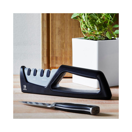 Henckels 4-stage handheld knife sharpener in black and gray