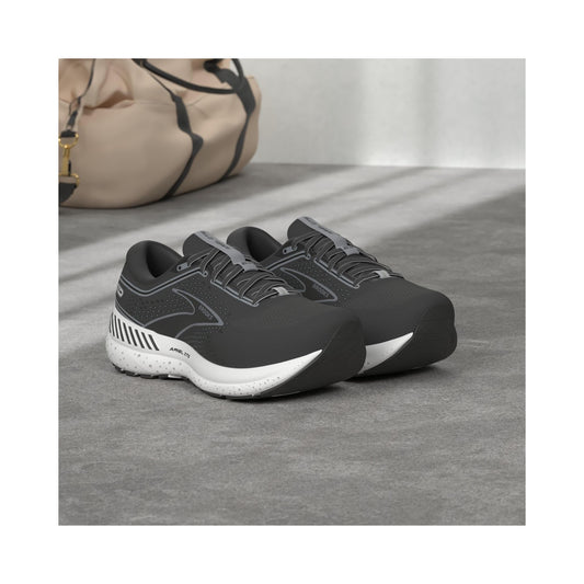Brooks Women's Ariel GTS 23 running shoe in black and white, side view