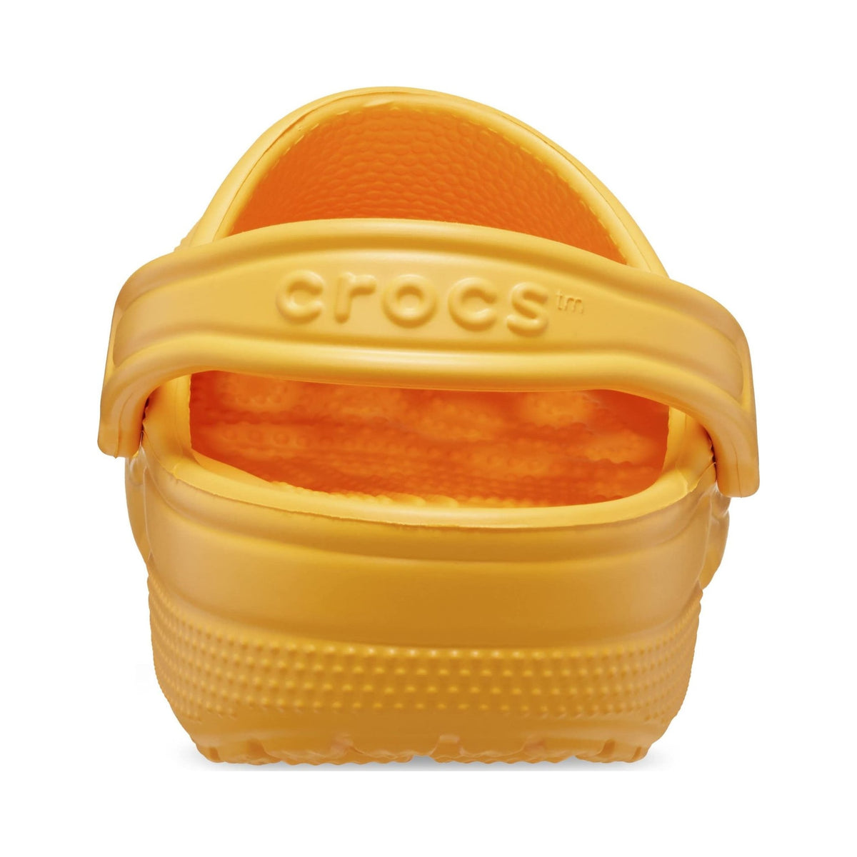 Crocs Classic Clog in yellow-orange, unisex slip-on clog shown from multiple angles