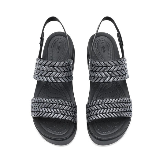 Crocs Women's Brooklyn Low Wedge Sandals in black with woven glitter straps